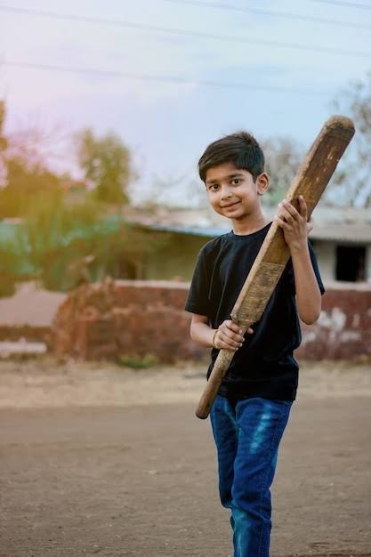 Coach guiding young cricketers at a Circle of Hope training ground